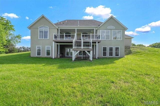 3033 Oakvale Rd, De Soto, MO 63020 - rear view of house featuring a deck, a lawn, stucco siding, french doors, and stairway