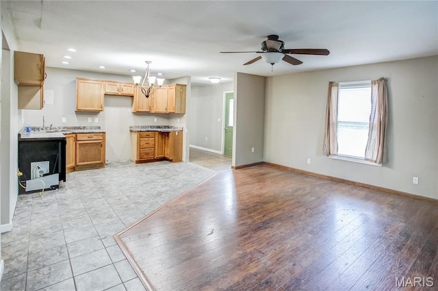 kitchen featuring a chandelier, healthy amount of natural light, baseboards, ceiling fan, and recessed lighting