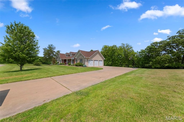 view of front facade featuring a front lawn, a garage, and concrete driveway