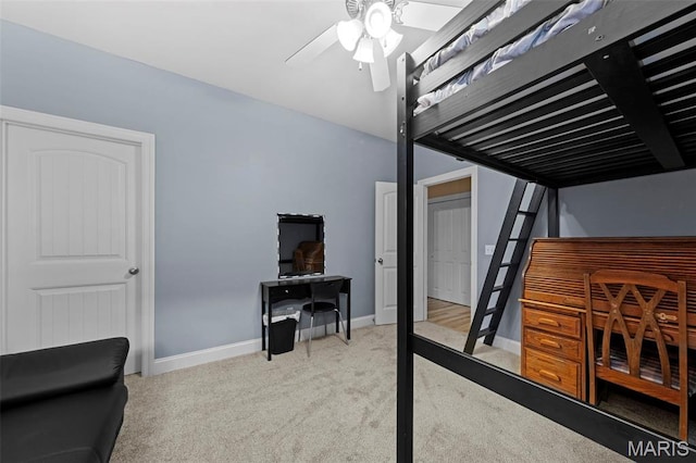 bedroom featuring carpet flooring, baseboards, and a ceiling fan