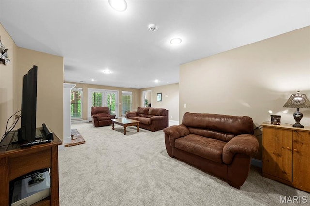 living room with carpet floors and recessed lighting