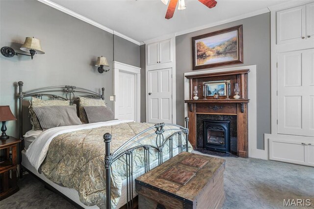 505 Thompson Ln, Arcadia, MO 63621 - bedroom with ornamental molding, carpet, a fireplace with flush hearth, and ceiling fan