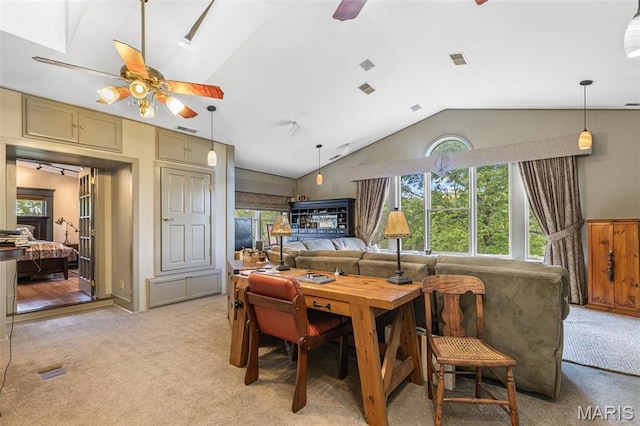 505 Thompson Ln, Arcadia, MO 63621 - dining space with ceiling fan, vaulted ceiling, light carpet, and healthy amount of natural light