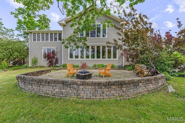505 Thompson Ln, Arcadia, MO 63621 - rear view of property featuring an outdoor fire pit, a lawn, and a patio