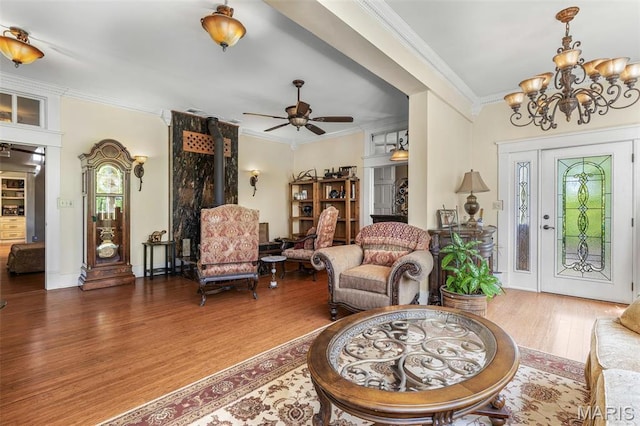 505 Thompson Ln, Arcadia, MO 63621 - foyer with ornamental molding, wood finished floors, plenty of natural light, a chandelier, and ceiling fan