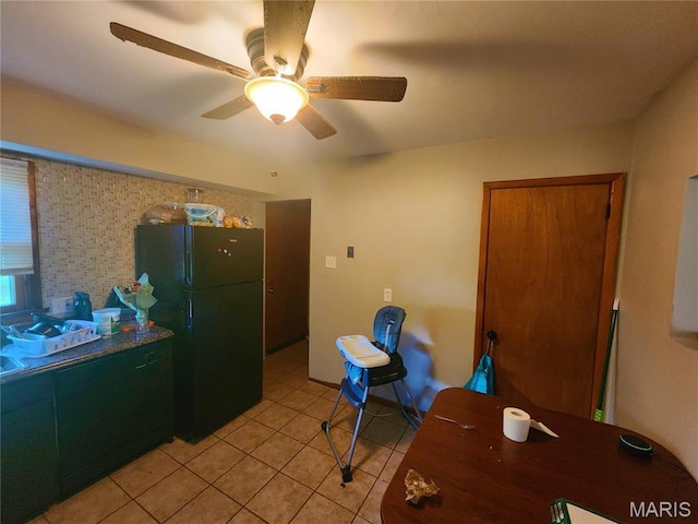 1437 Farmview Ave, Saint Louis, MO 63138 - kitchen featuring freestanding refrigerator, light tile patterned floors, and ceiling fan