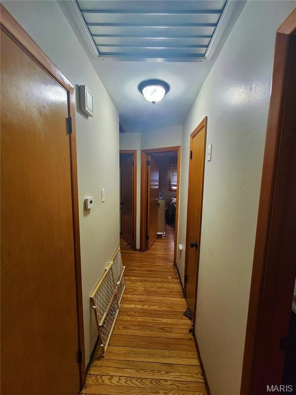 1437 Farmview Ave, Saint Louis, MO 63138 - corridor with light wood-style flooring