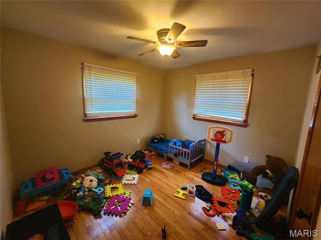 1437 Farmview Ave, Saint Louis, MO 63138 - game room featuring ceiling fan and wood finished floors