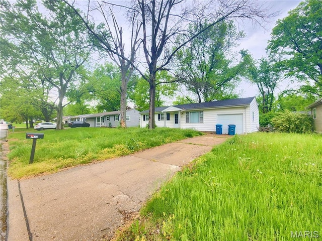 1437 Farmview Ave, Saint Louis, MO 63138 - ranch-style home with an attached garage and driveway