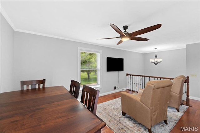8316 D Rd, Waterloo, IL 62298 - living room featuring ceiling fan, a chandelier, crown molding, wood finished floors, and baseboards