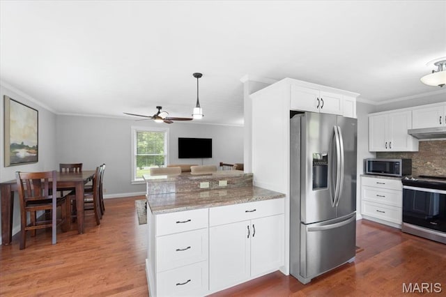 8316 D Rd, Waterloo, IL 62298 - kitchen with stainless steel appliances, ornamental molding, under cabinet range hood, ceiling fan, and wood finished floors