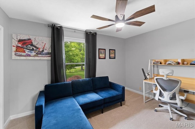 8316 D Rd, Waterloo, IL 62298 - office area with light carpet, ceiling fan, and baseboards