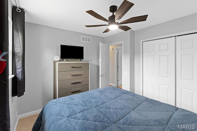 8316 D Rd, Waterloo, IL 62298 - bedroom featuring baseboards, carpet flooring, a closet, and a ceiling fan