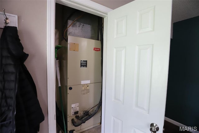 1507 Vine St, Poplar Bluff, MO 63901 - utility room featuring heating unit