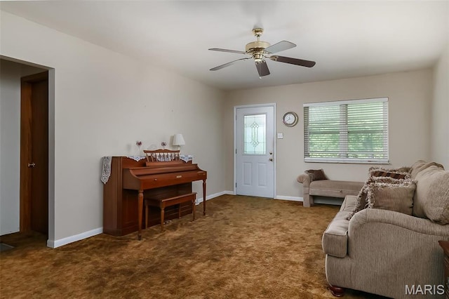 128 Cumberland Ave, Maryland Heights, MO 63043 - carpeted living area with a ceiling fan and baseboards
