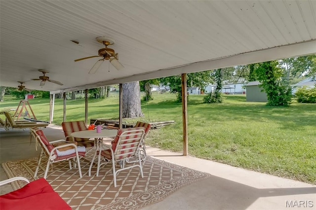128 Cumberland Ave, Maryland Heights, MO 63043 - view of patio / terrace featuring outdoor dining space and a ceiling fan