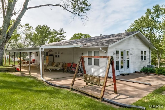 128 Cumberland Ave, Maryland Heights, MO 63043 - back of property featuring a patio area and a yard