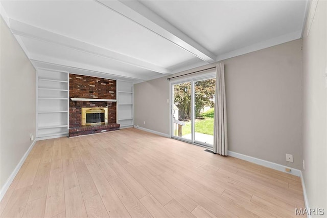 3009 Country Knoll Dr, Saint Charles, MO 63303 - unfurnished living room with baseboards, beam ceiling, light wood-style flooring, and a brick fireplace