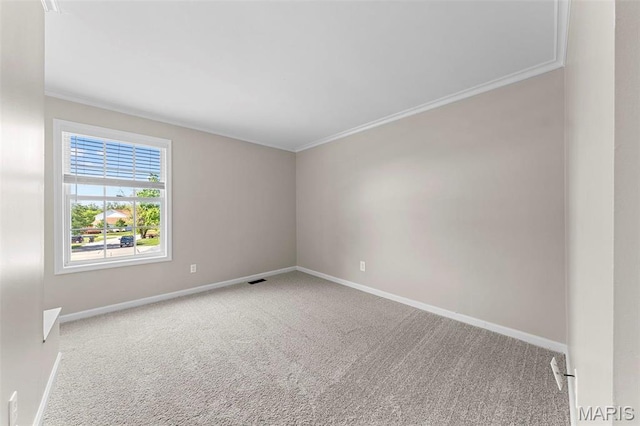 3009 Country Knoll Dr, Saint Charles, MO 63303 - spare room featuring carpet floors, crown molding, and baseboards