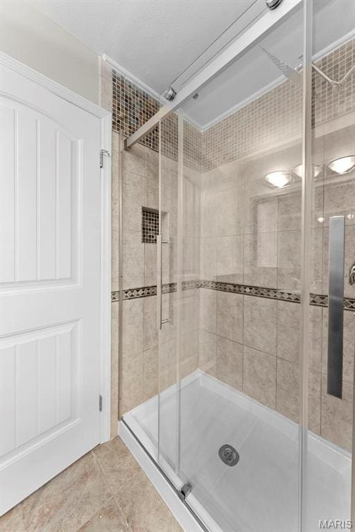 3009 Country Knoll Dr, Saint Charles, MO 63303 - bathroom featuring a shower stall and tile patterned floors
