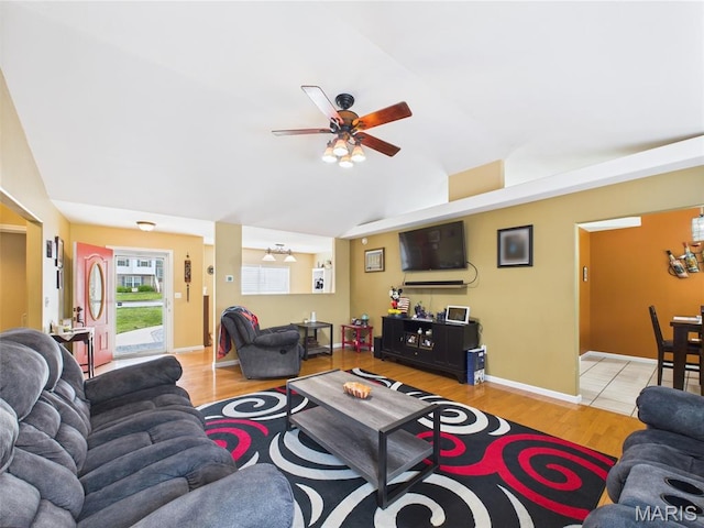 109 Locust Ct, Saint Robert, MO 65584 - living room featuring a ceiling fan, lofted ceiling, wood finished floors, and baseboards