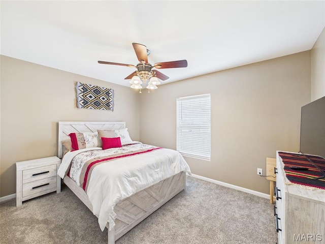 109 Locust Ct, Saint Robert, MO 65584 - bedroom with carpet floors, baseboards, and a ceiling fan