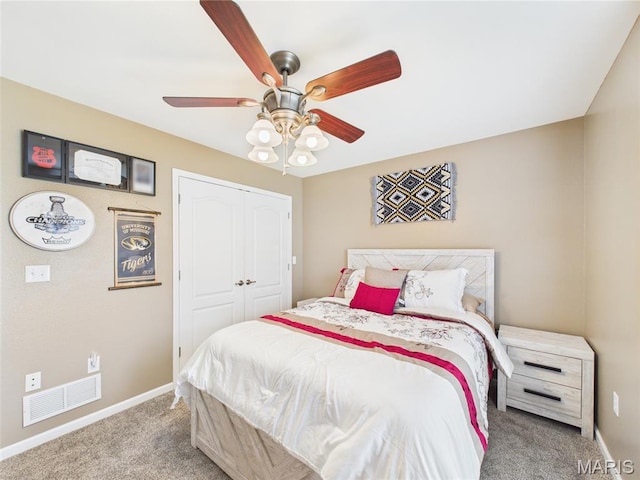 109 Locust Ct, Saint Robert, MO 65584 - bedroom featuring carpet floors, baseboards, a closet, and ceiling fan