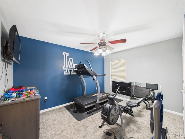 109 Locust Ct, Saint Robert, MO 65584 - workout room with a ceiling fan, carpet floors, and baseboards