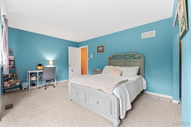 carpeted bedroom featuring baseboards