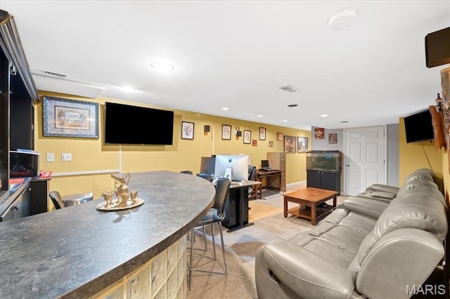 living area with recessed lighting