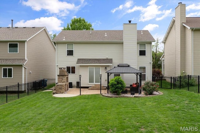 rear view of property featuring a gazebo, a patio area, a chimney, and entry steps