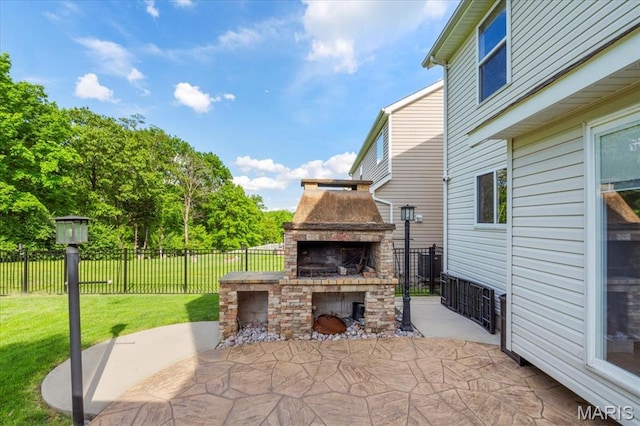 view of patio featuring an outdoor stone fireplace