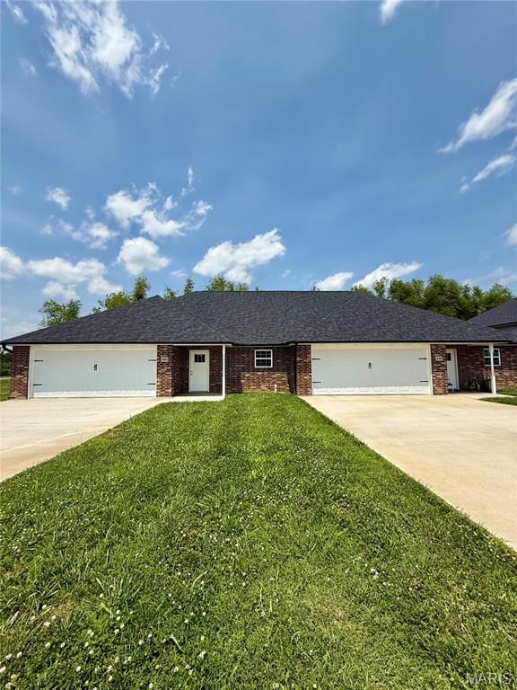 400 E Deerwood Drive 400 & 402, Jackson, MO 63755 - ranch-style house featuring driveway, brick siding, a garage, and a front yard