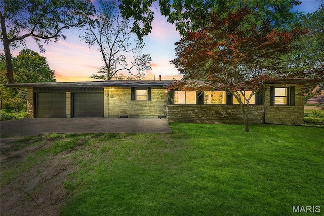 701 Hillsboro Rd, Farmington, MO 63640 - view of front of house with stone siding, a yard, a garage, and driveway