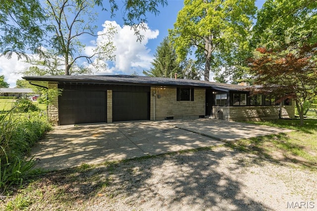 701 Hillsboro Rd, Farmington, MO 63640 - ranch-style house with an attached garage, concrete driveway, stone siding, and crawl space