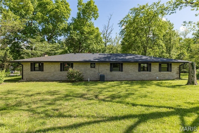 701 Hillsboro Rd, Farmington, MO 63640 - rear view of property with a lawn, stone siding, and central AC unit