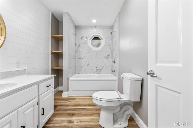 701 Hillsboro Rd, Farmington, MO 63640 - bathroom featuring wood finished floors, toilet, vanity, baseboards, and wood walls