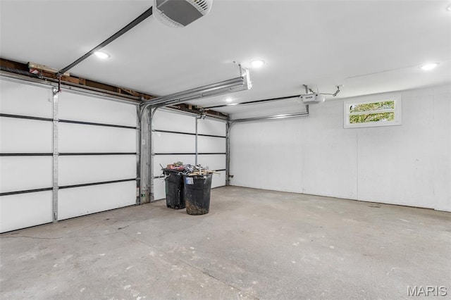 701 Hillsboro Rd, Farmington, MO 63640 - garage featuring a garage door opener and recessed lighting