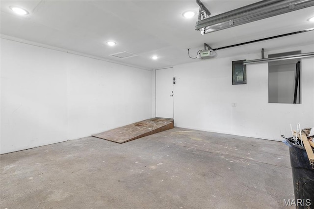 701 Hillsboro Rd, Farmington, MO 63640 - garage featuring recessed lighting and a garage door opener