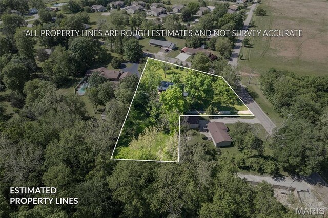 701 Hillsboro Rd, Farmington, MO 63640 - aerial perspective of suburban area with property parcel outlined