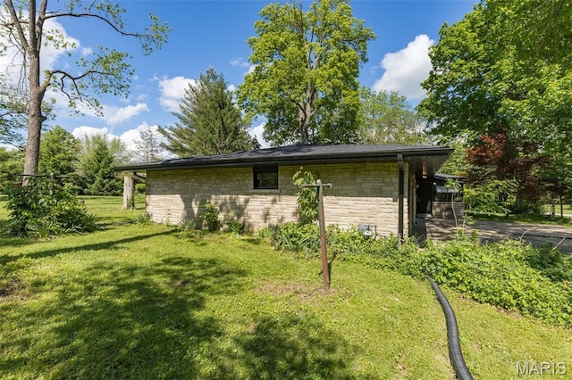701 Hillsboro Rd, Farmington, MO 63640 - view of side of property with a yard and stone siding