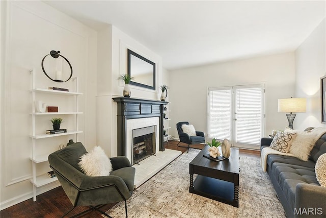 10 N Taylor Ave # 1S, Saint Louis, MO 63108 - living room with a fireplace and wood finished floors