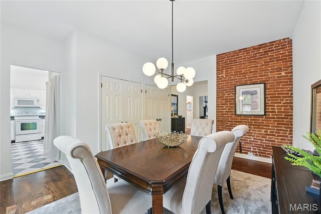 10 N Taylor Ave # 1S, Saint Louis, MO 63108 - dining room with wood finished floors and a chandelier