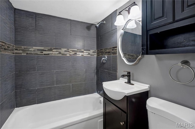 full bath with toilet, tub / shower combination, and vanity