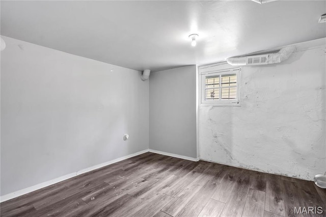 basement featuring wood finished floors