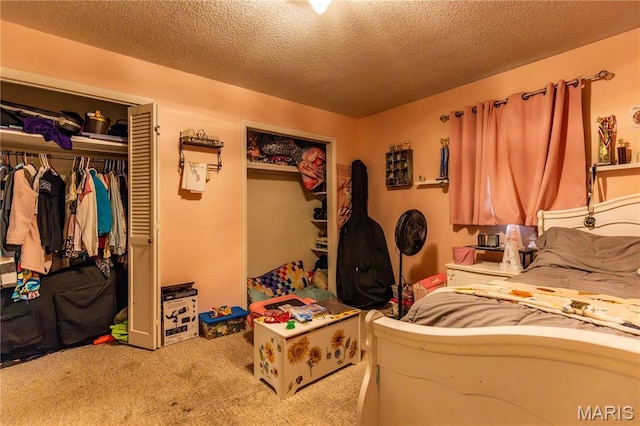 211 E Elm, Bertrand, MO 63823 - carpeted bedroom with a textured ceiling