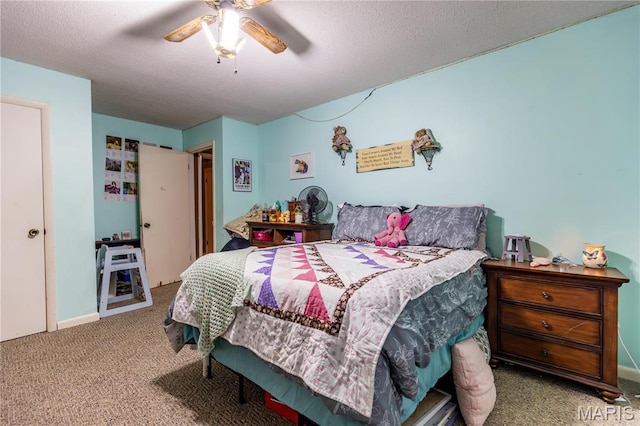 211 E Elm, Bertrand, MO 63823 - bedroom with carpet flooring, ceiling fan, and a textured ceiling