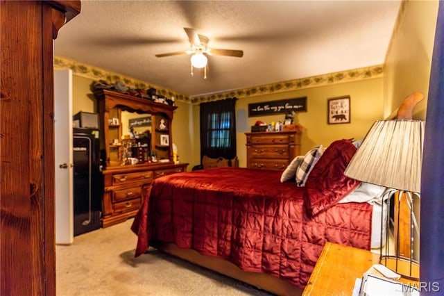 211 E Elm, Bertrand, MO 63823 - bedroom with light carpet and ceiling fan