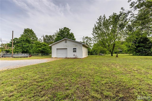 211 E Elm, Bertrand, MO 63823 - detached garage featuring gravel driveway