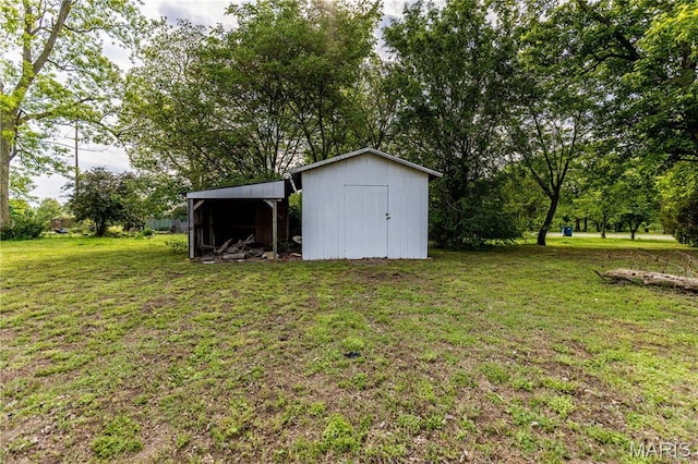 211 E Elm, Bertrand, MO 63823 - view of grassy yard